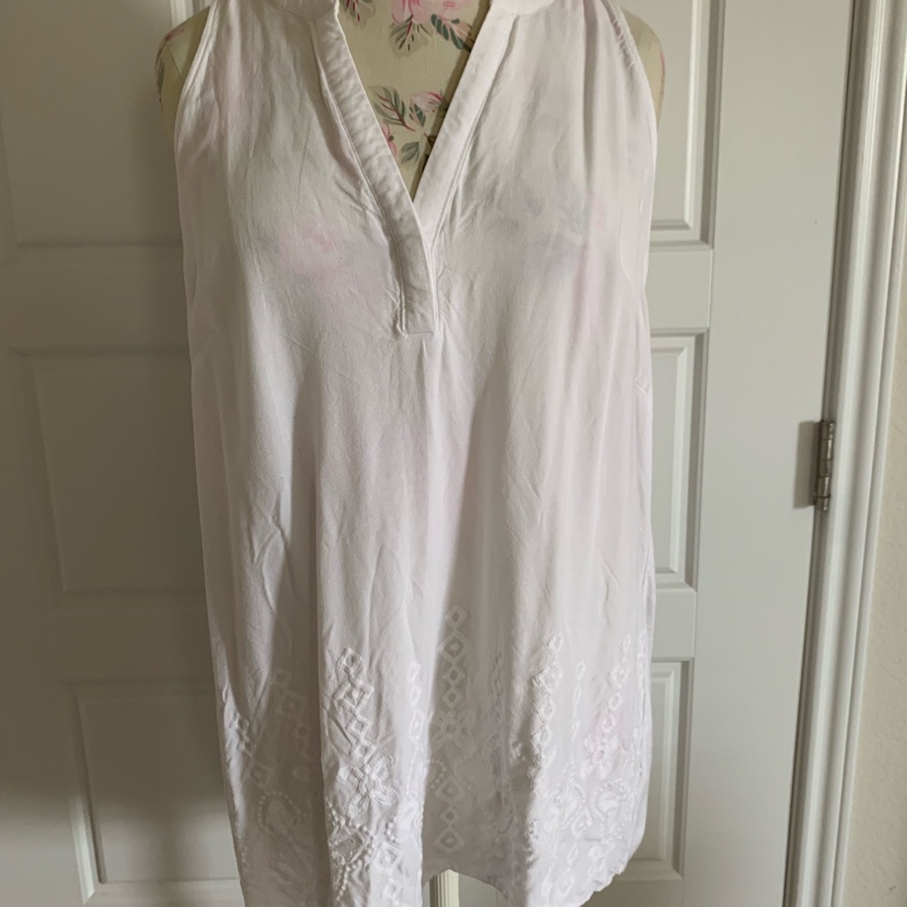 White tunic length blouse with embroidery detail